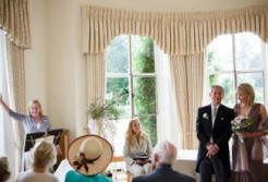 Sovra Newman singing at a wedding at Cambridge Cottage, Kew Gardens.