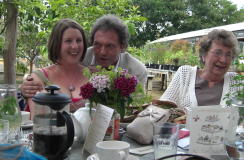 Leon Berger singing to a bride-to-be at a Hen Tea Party, Petersham Nurseries, Surrey.